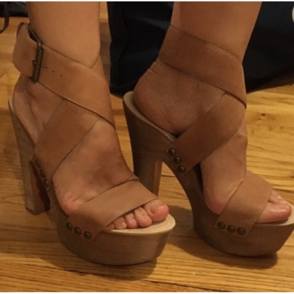 Leather strapped platform heels.